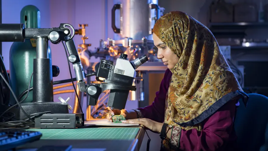 Scientist working with laboratory equipment